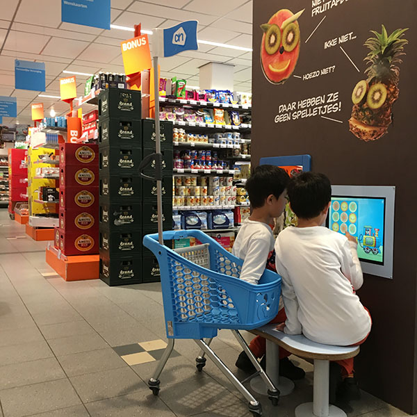 Albert Heijn kids corner supermarket This picture shows two boys playing at the Albert Heijn kids corner supermarket