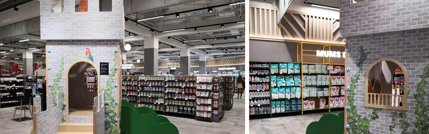 Op deze afbeelding staat een custom kinderhoek geplaatst in een supermarkt