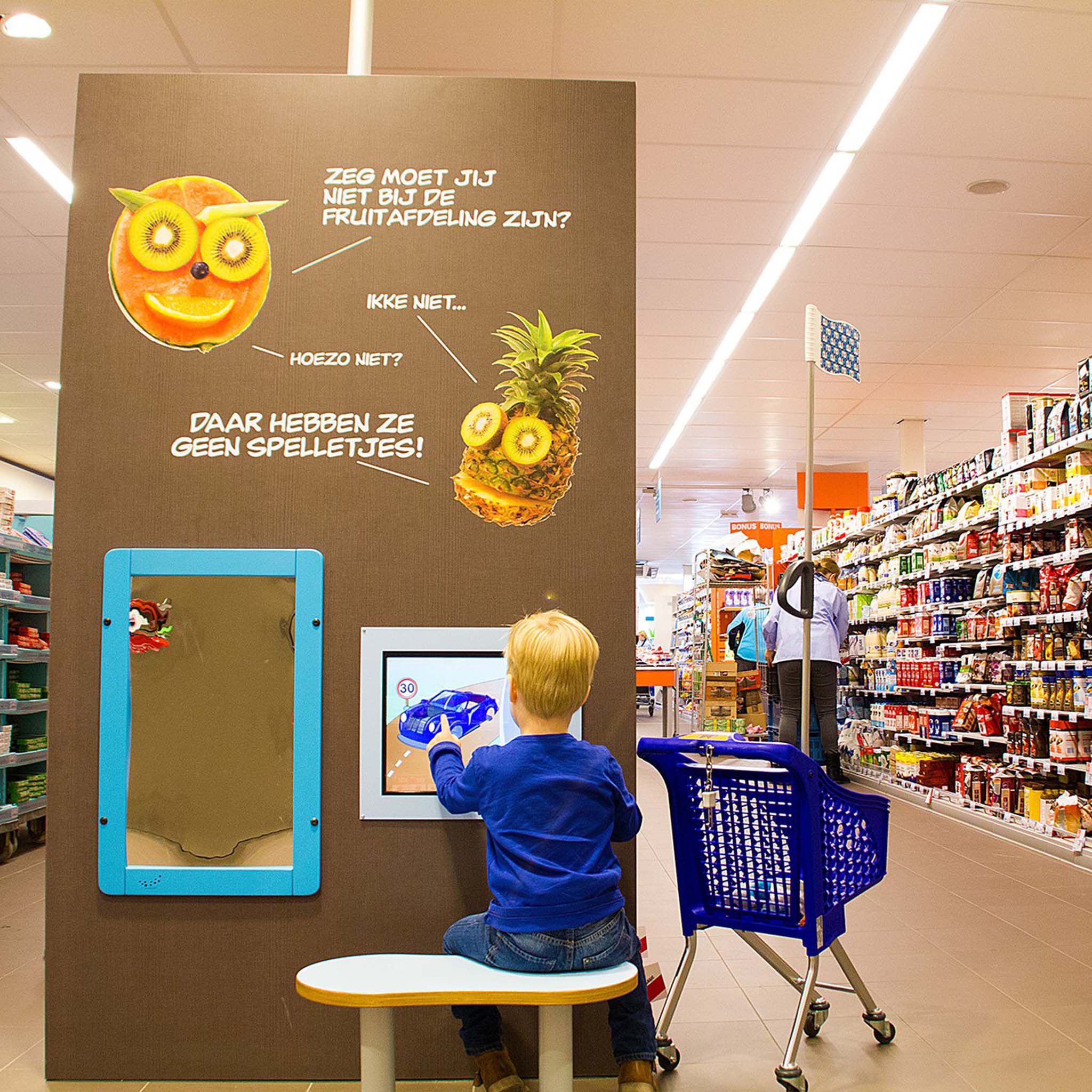 Spelen bij Albert Heijn met een IKC Wandopstelling Spelen bij Albert Heijn met een IKC Wandopstelling