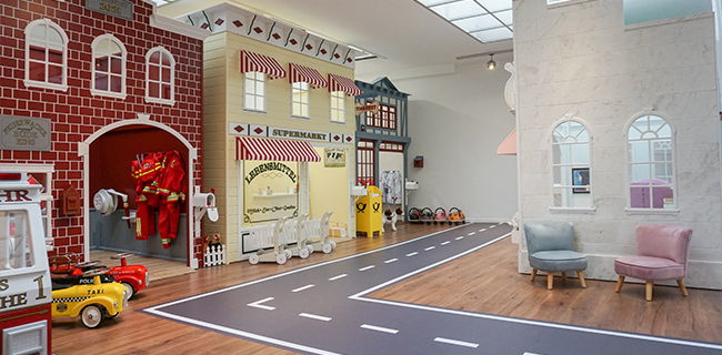 IKC speelhoek met keukentje voor kinderen in kindercafe Bude Eins in Pempelfort Duitsland