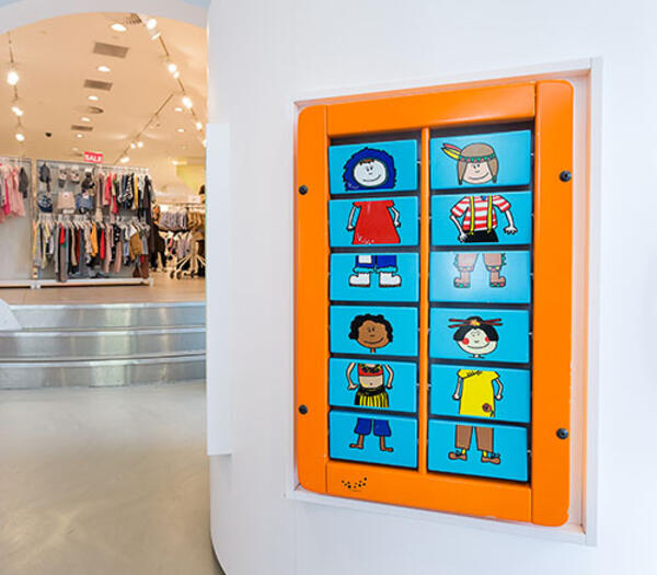 this image shows a kids corner in a H&M clothing store